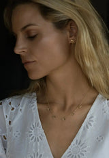 Solid gold Colony Bee Necklace with 5 detailed mini bee pendants on a fine adjustable chain, handcrafted and nature-inspired