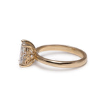 Oval engagement ring with intricate bee-inspired design, adorned with a sparkling 1.2ct diamond or lab-grown moissanite